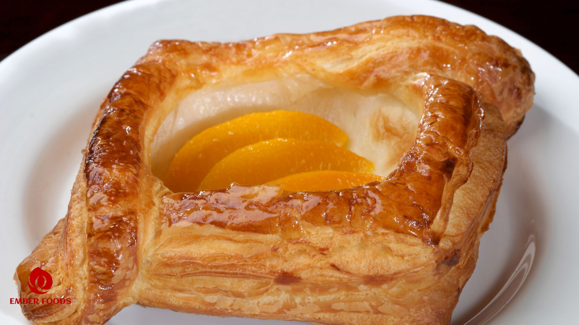 Nhà phân phối Bánh Danish đào giá sỉ cho chuỗi Phê La, Phúc long, Highland, Katinat Distributor of wholesale peach Danish cakes for Phe La, Phuc Long, Highland, Katinat chains